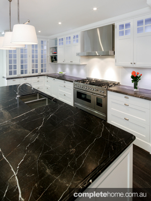 classic kitchen design with marble benchtop and stainless steel appliances