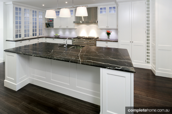 classic kitchen design with marble benchtop and stainless steel appliances