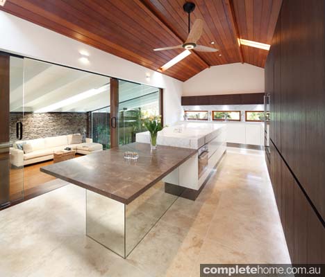 Embracing neutral and warm tones, this kitchen is practical, simplistic and inviting.