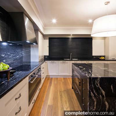 Take the splashback all the way up and across the wall behind the rangehood canopy to make the cooktop area an impressive focal point of the space. 