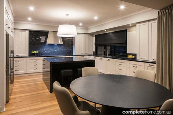 Take the splashback all the way up and across the wall behind the rangehood canopy to make the cooktop area an impressive focal point of the space. 