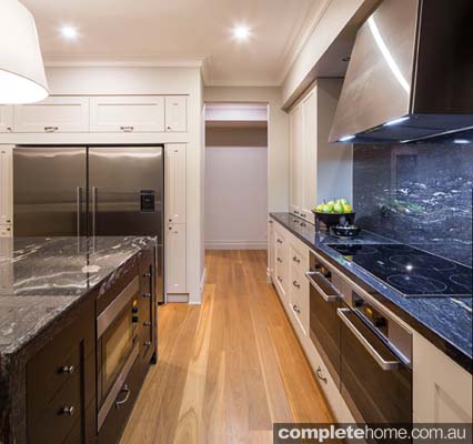 Take the splashback all the way up and across the wall behind the rangehood canopy to make the cooktop area an impressive focal point of the space. 