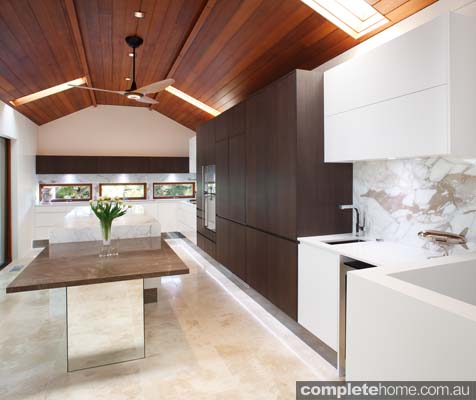 Embracing neutral and warm tones, this kitchen is practical, simplistic and inviting.