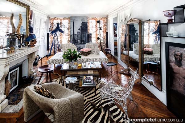 Living room in an eclectic apartment in Paris owned by Sacha Walckhoff.