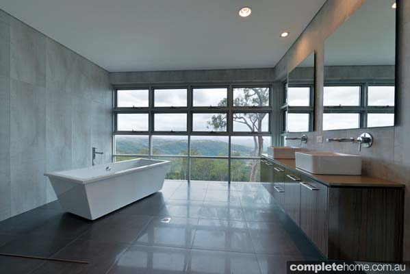 A beautiful bathroom with an ocean view.