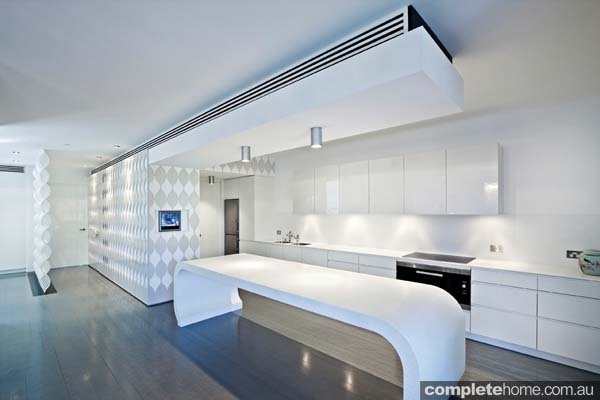 A curved island bench kitchen from Saaj.