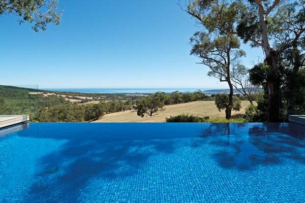 A modern pool design with panoramic views