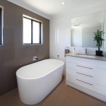 Gorgeous white bathroom with pearl tiles