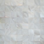 Gorgeous white bathroom with pearl tiles