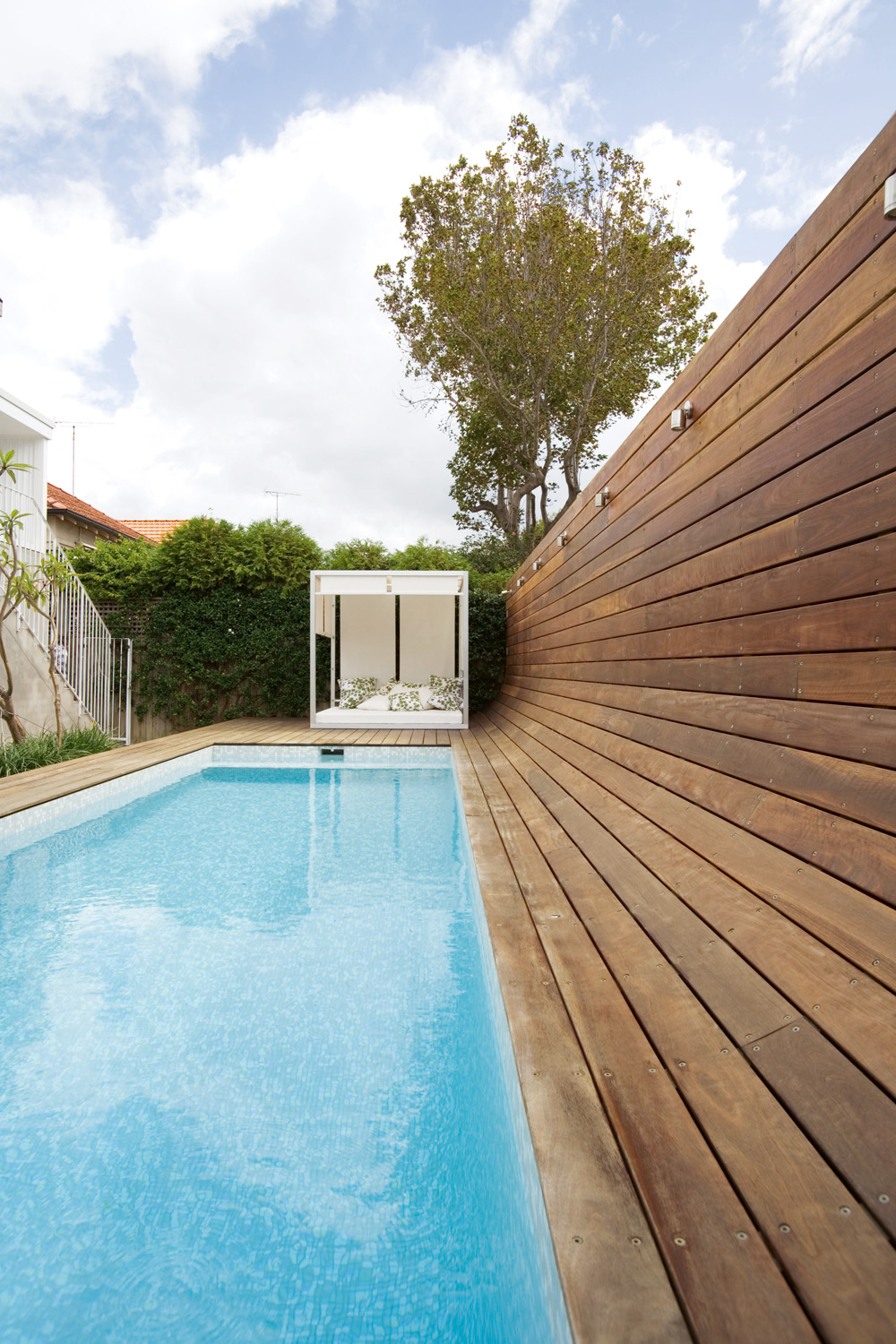 Pool renovation: Modern timber pool area - Completehome