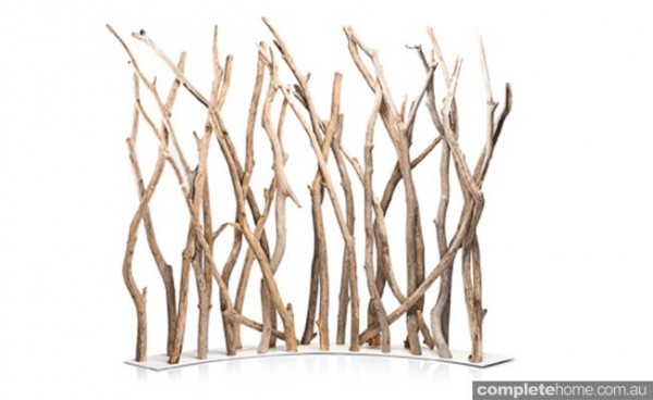 Outdoor screen in timber and branches natural aesthetic by Coco Republic