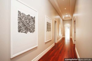 long chic hallway with timber floorboards