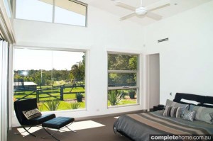 cathedral ceilings and country views from this modern bedroom
