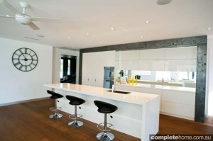 modern white kitchen with timber flooring