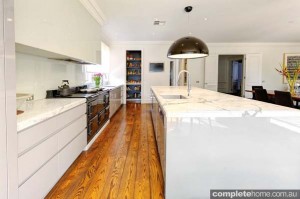 modern kitchen with timber floorboards
