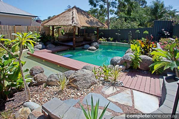 Backyard pool decked fencing and balinese hut