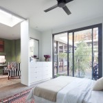 The bedrooms, as well
as the rest of the house, centre on a courtyard with moveable glass walls