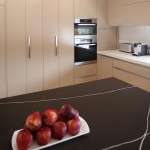 Functional kitchen with hidden laundry