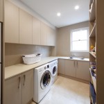 Functional kitchen with hidden laundry
