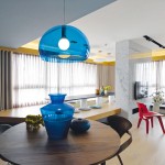 Blue accessories add depth and ambience to the neutral space