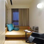 Copy that: Accessories such as this bright turquoise cushion pop against a neutral colour scheme