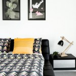 Strong contrasts and bold prints maintain the
modern style in the master bedroom
