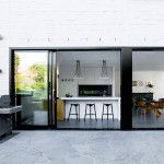 The spectacular double-storey void has 5m-high floor-to-ceiling glass