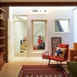 Pops of red and orange bring instant warmth to the room