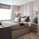 A padded linear wall serves as a generous bedhead