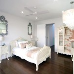 Hints of baby pink and creamy white make this bedroom pure elegance