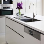 A white modern sink with bright flowers