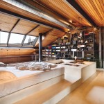 Expert tip:  Opting for neutral linen complements the rich timber feature wall
