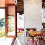 The kitchen opens up on both sides thanks to bi-fold doors