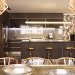 Brass elements add a glamorous and warm feel to the space
