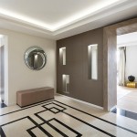 A black and cream marble floor is a luxe addition to the foyer