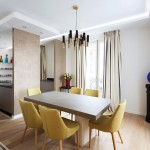 Straw-coloured chairs bring a natural element to the dining room