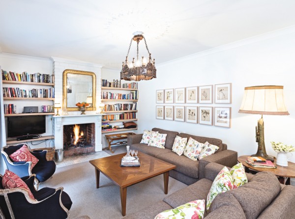 The fire can be enjoyed on the cosy lounges in the living room.