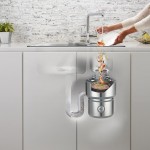 A view of a person washing food down the drain and how it gets disposed of.