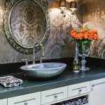 A wallpapered bathroom indicates a luxe affair