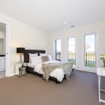 The look of a neutral bedroom can be changed seasonally through accessories