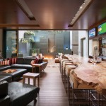 A timber benchtop adds a natural element to the bar