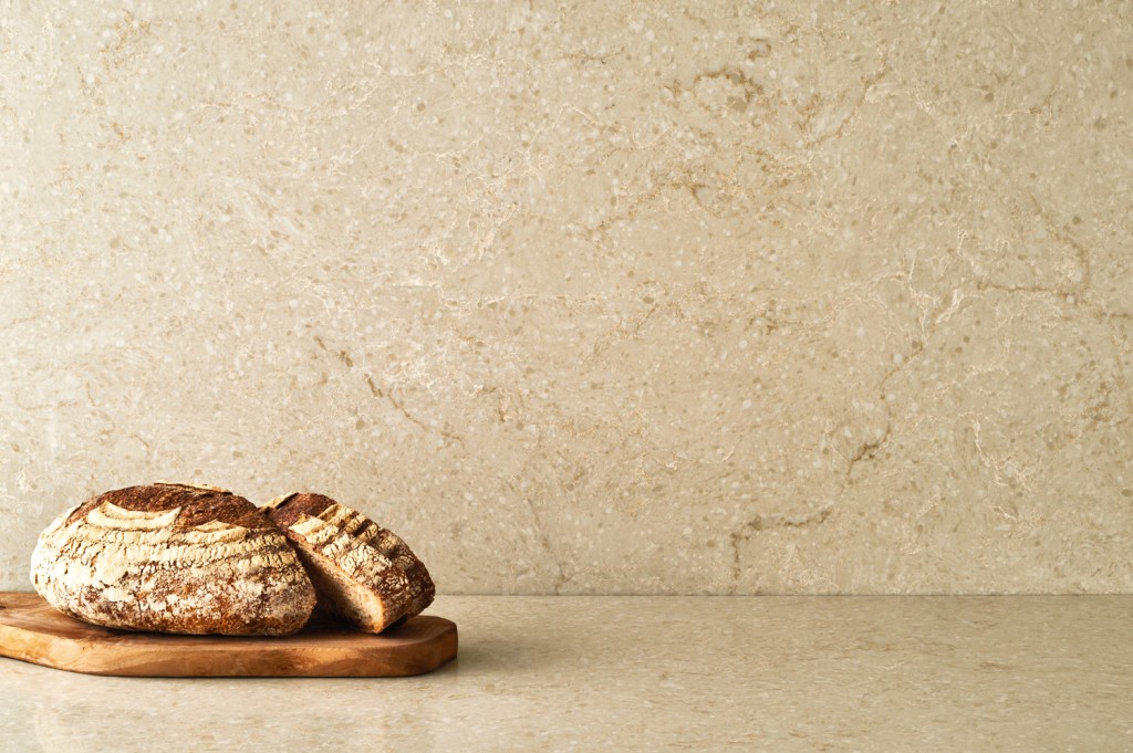 The warm hues of the Taj Royal from CAESARSTONE make any room inviting. Showcase the delicate veins, rich depth and soft texture as a feature wall, splashback or go crazy and cover all four walls. caesarstone.com.au
