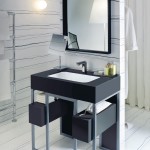 The smooth lines of a Corian Serenity basin installed within a frame of steel and Corian Deep Nocturne create a sophisticated impression. With atmospheric lighting, it becomes the statement centrepiece for a hotel suite or penthouse.