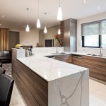 Timber cabinetry brings an earthy element to the opulent space