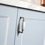 This compact kitchen design makes up for space by incorporating cupboards and drawers within a U-shaped bench