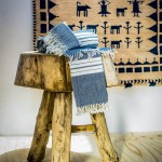 Monsoon wool rug/wall hanging dyed with natural indigo, Kala organic cotton throw, bath towel and hand towel hand-dyed with iron and natural indigo. hempgallery.com.au Wooden table. stonepony.com.au