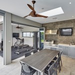 The covered gym space looks out to the garden