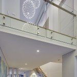 The floating timber staircase is a standout design feature of the home