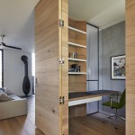 WE LOVE The raw concrete walls that bring an industrial edge to the home