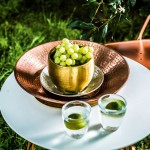 Gava planter (pair), Gava antique silver dish and Gava copper-plated dish, antique brass oval platter and Ripple Italian tumbler glasses. cittadesign.com Splice table in bronze.  lifeinteriors.com.au